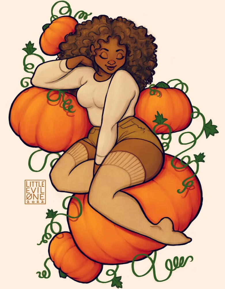Black woman with natural curls sitting on and among pumpkins wear a cream and beige outfit